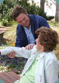 A caregiver and client enjoying time outdoors